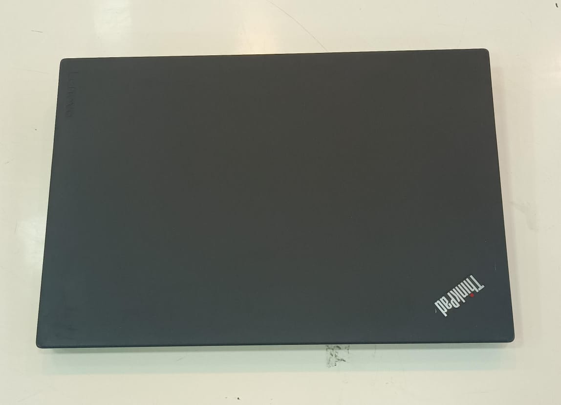 Black ThinkPad laptop on a table